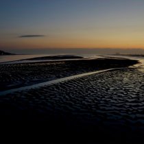 couché de soleil sur la baie de Seine - image graphique- Normandie - Alain Montaufier Photographe professionnel basé à Poitiers